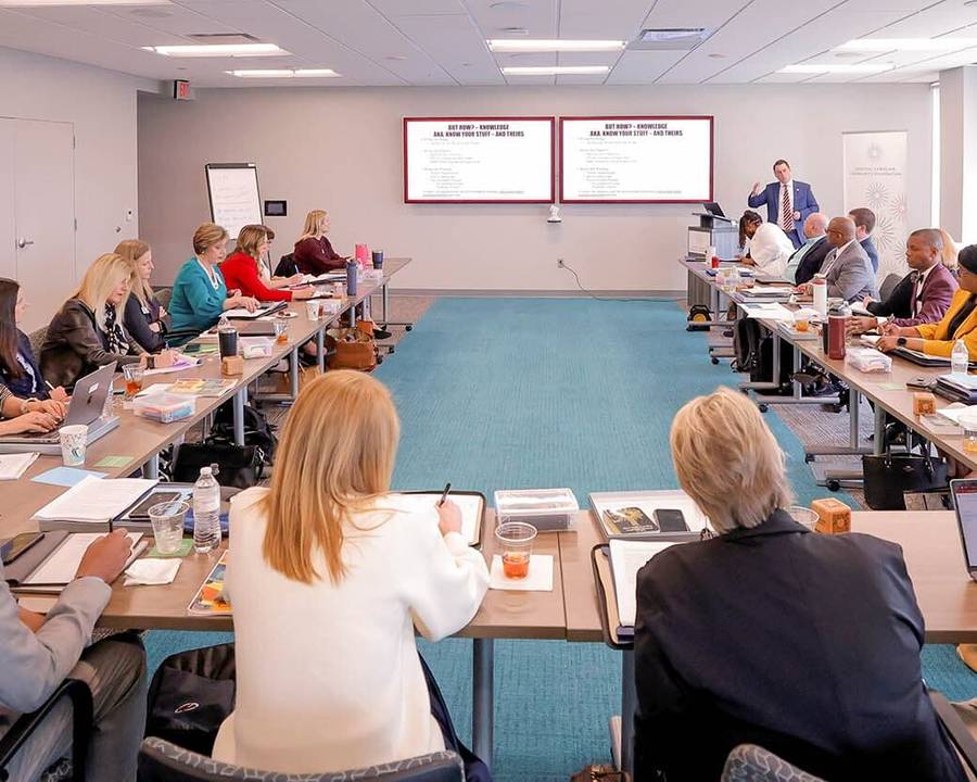 Cross-sector leaders in a Litmus working session