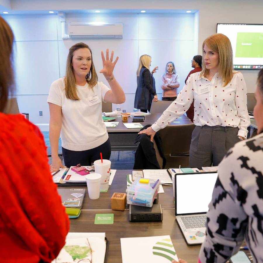 Litmus team members in conversation during a session